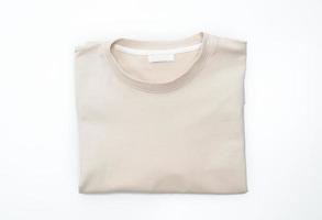 Folded t-shirt isolated on white background photo