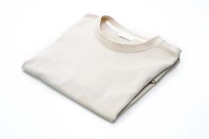 Folded t-shirt isolated on white background photo