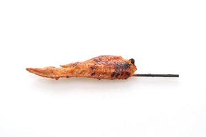 Grilled or barbecue chicken wings skewer with sticky rice photo