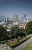 Urban skyline view from Guia Fortress with tower blocks in central Macau City China photo