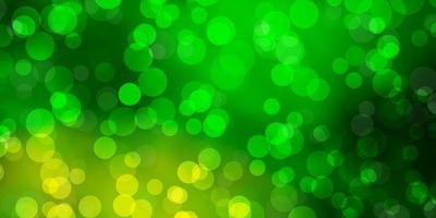 Light Green vector background with spots.