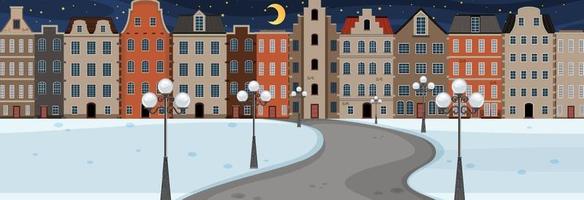 Winter season with road through the park into the town at night vector