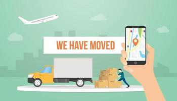 we have moved text banner title with hand holding smartphone and truck vector