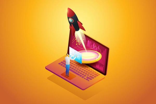 Startup business plan launching a rocket on laptop.