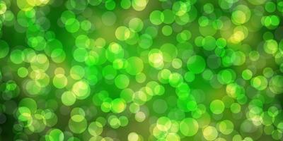 Light Green, Yellow vector background with spots.