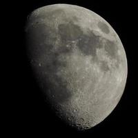 Gibbous moon seen with telescope photo