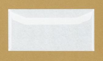 Letter envelope om brown background photo