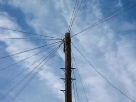 Telecommunications pole for wires and fibre optics photo