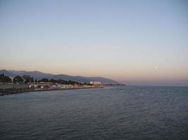 Sunset under the seafront of Adler city photo