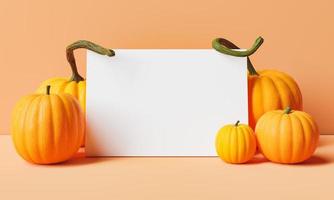 Blank frame with pumpkins around on pastel background photo