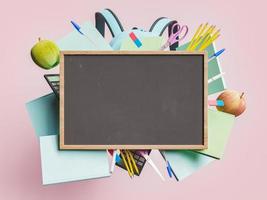 Empty blackboard with school supplies photo