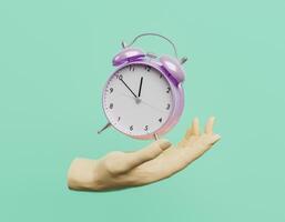 Hand with an alarm clock floating photo