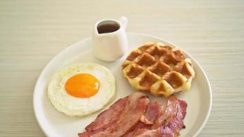 Fried egg with waffle and bacon video