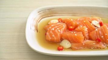 Fresh salmon raw pickled in soy sauce in Korean style video