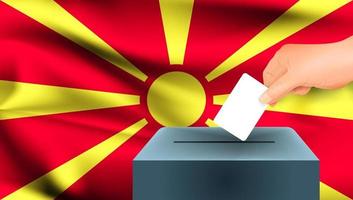 bandera de macedonia, mano masculina votando con fondo de bandera de macedonia vector