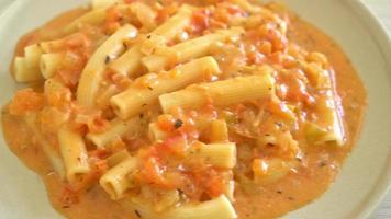 Rigatoni penne pasta with creamy tomatoes pink sauce video