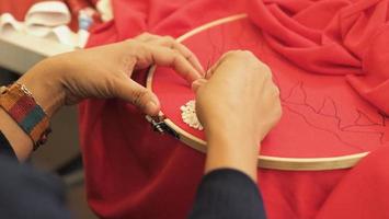 Embroider sewing by hand photo