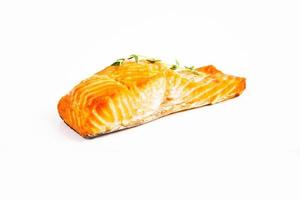 Baked piece of fresh trout with thyme photo
