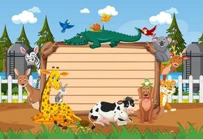 Empty wooden board with various wild animals in the forest vector