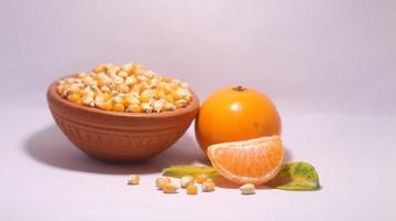 Whole and haves ripe oranges on white background with clipping path. photo