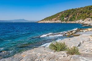 clear and blue waters of the aegean sea for tourists photo