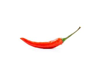 Single fresh red pepper isolated on white background photo