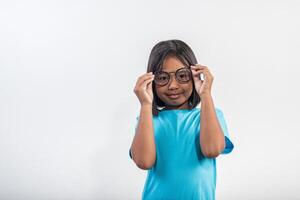 Little girl thinking in studio shot. photo