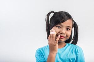 Portrait little girl makeup with her face. photo