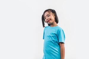 Portrait of Funny little girl acting in studio shot. photo