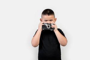 Kid photographer take a photo. photo