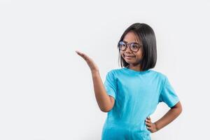 Little girl thinking in studio shot. photo