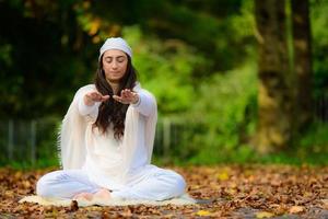 Yoga instructor practices exercises photo