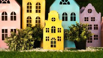 Small cardboard colorful houses made by hand. photo