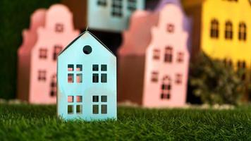 Small cardboard colorful houses made by hand. photo