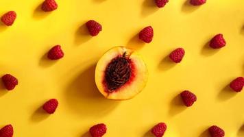 Raspberries and peaches for healthy summer eating photo