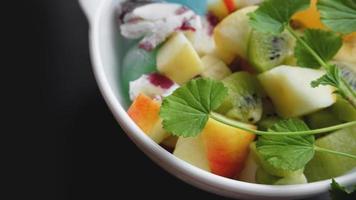 Close up desert with fresh fruit and ice cream photo