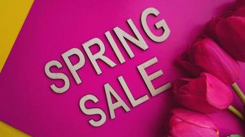 Spring sale banner with pink tulips photo