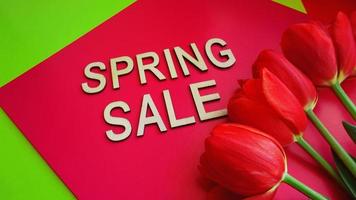 Spring sale banner with pink tulips photo