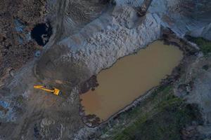 Aerial photo of a yellow digger