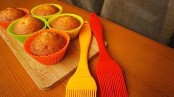 Simple mini muffins in colorful silicone bakeware photo