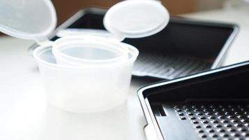 Empty plastic containers for sushi set. Take away lunch box photo