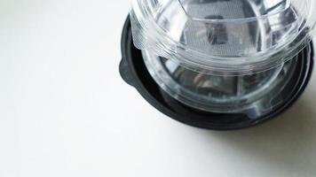 Black and white Plastic food container on white background photo