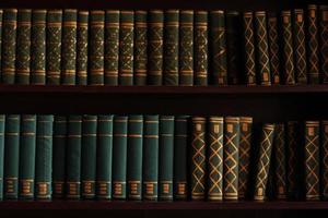 Old books on an archival shelf of library of storehouse photo