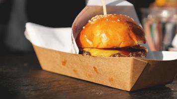 Beef burgers being served on food stall on open kitchen photo