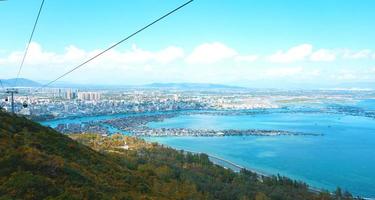 Cable car against the background of the Hainan Province, China photo