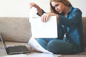 Serious woman focused on finding information photo