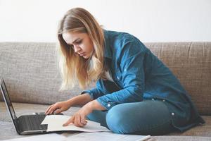 Serious woman focused on finding information photo