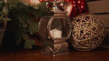 Christmas lantern on old wooden background photo