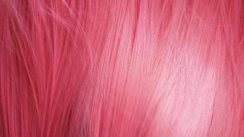 textura de primer plano de cabello rosado. puede usarse como fondo foto