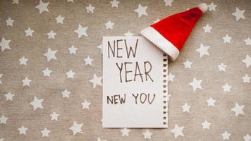 Text new year new you in the new year notebook photo